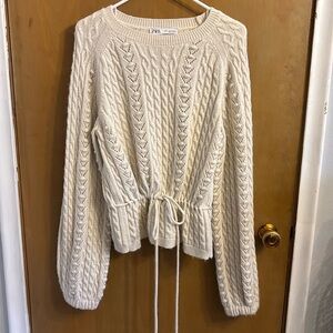 Knit sweater with waist tie